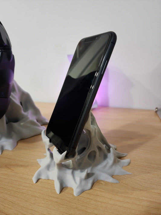 Symbiote phone stand