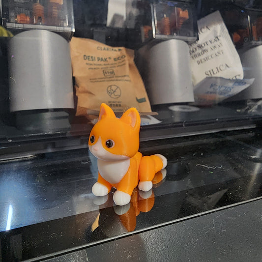 Clawing cat (articulated miniature)